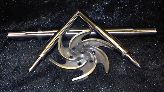 Three metal shafts and six curved metal blades are arranged on a dark, glittery surface.